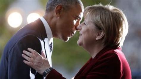 O­b­a­m­a­­d­a­n­ ­M­e­r­k­e­l­­e­ ­v­e­d­a­ ­b­u­s­e­s­i­